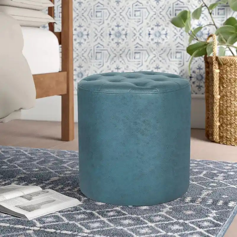 Pouffe rond tapissé en simili cuir capitonné