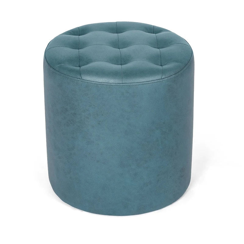 Pouffe rond tapissé en simili cuir capitonné
