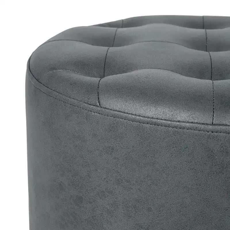 Pouffe rond tapissé en simili cuir capitonné
