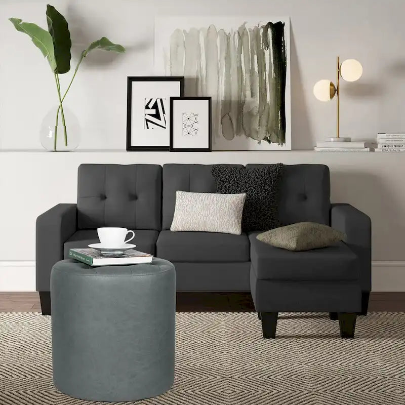 Pouffe rond tapissé en simili cuir capitonné