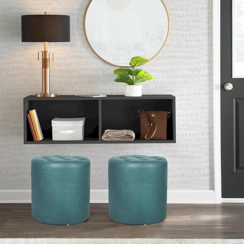 Pouffe rond tapissé en simili cuir capitonné