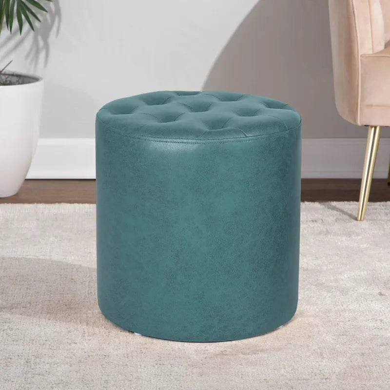 Pouffe rond tapissé en simili cuir capitonné