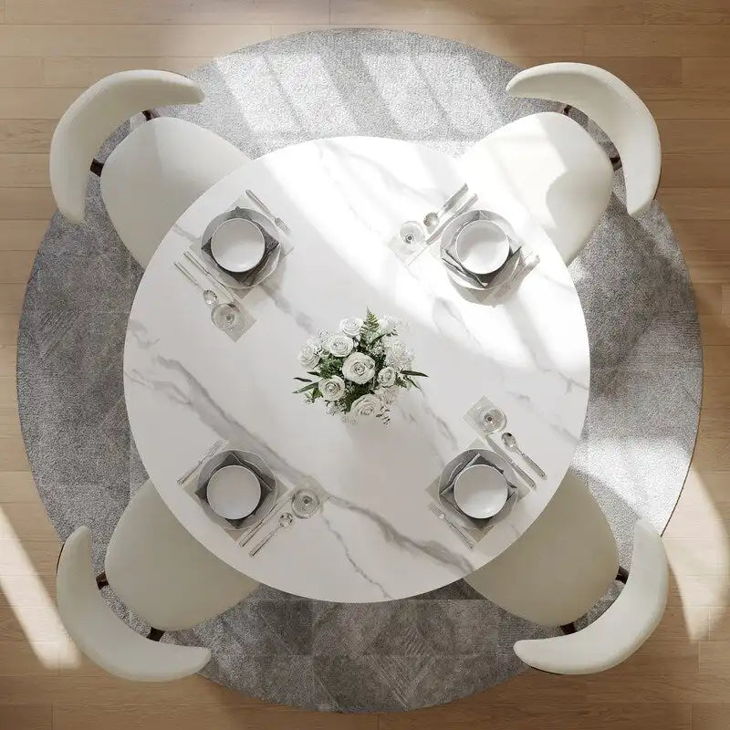 Table à manger ronde moderne avec plateau en pierre brillante blanche et piédestal en bronze