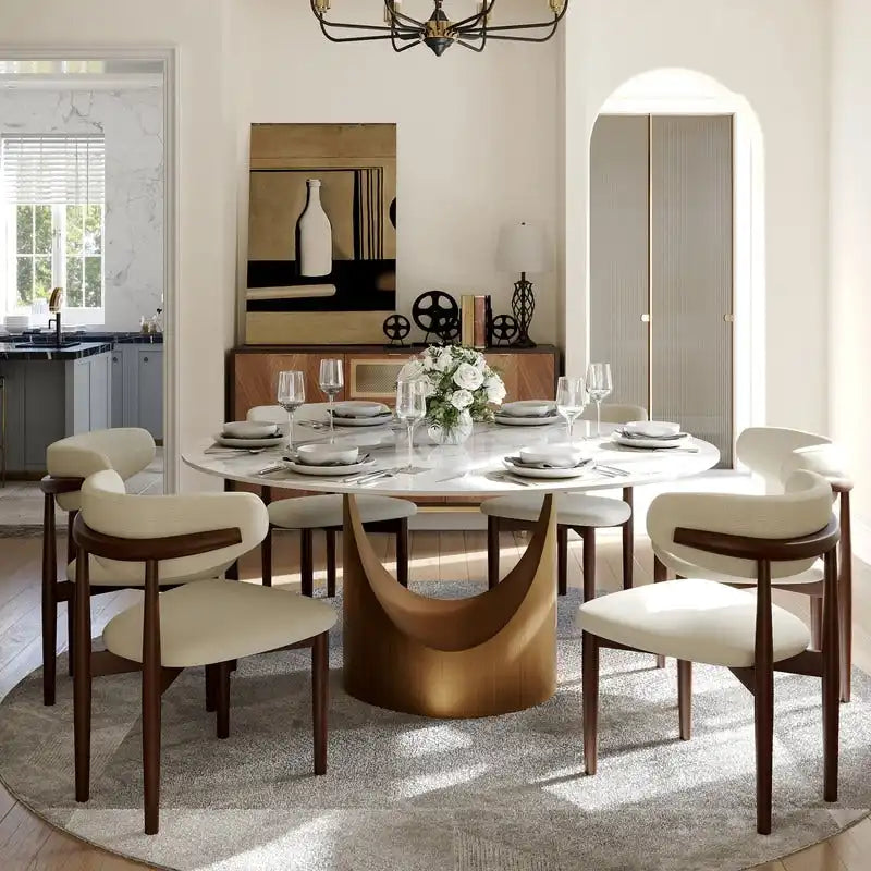 Table à manger ronde moderne avec plateau en pierre brillante blanche et piédestal en bronze
