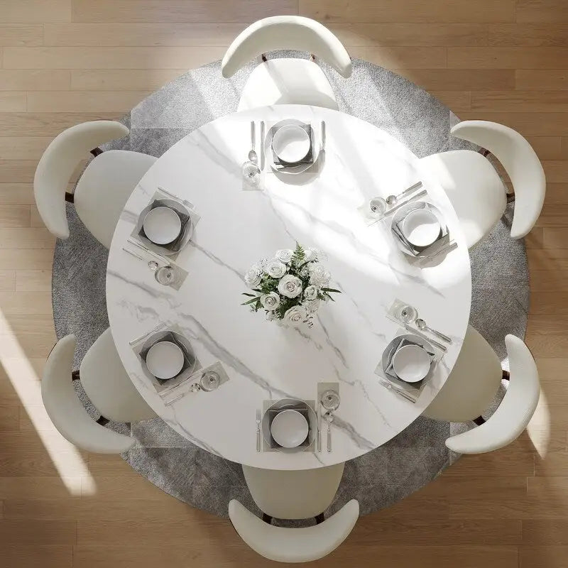 Table à manger ronde moderne avec plateau en pierre brillante blanche et piédestal en bronze