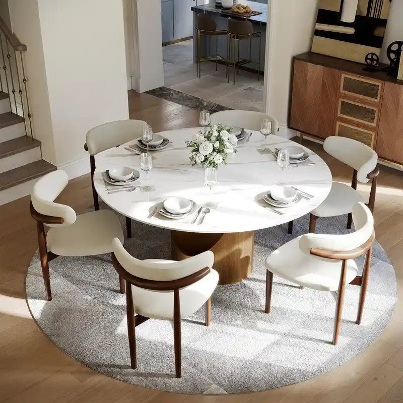 Table à manger ronde moderne avec plateau en pierre brillante blanche et piédestal en bronze