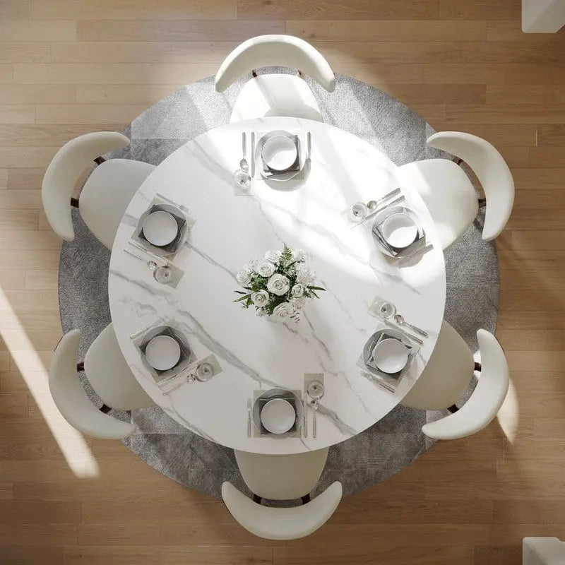 Table à manger ronde moderne avec plateau en pierre brillante blanche et piédestal en bronze